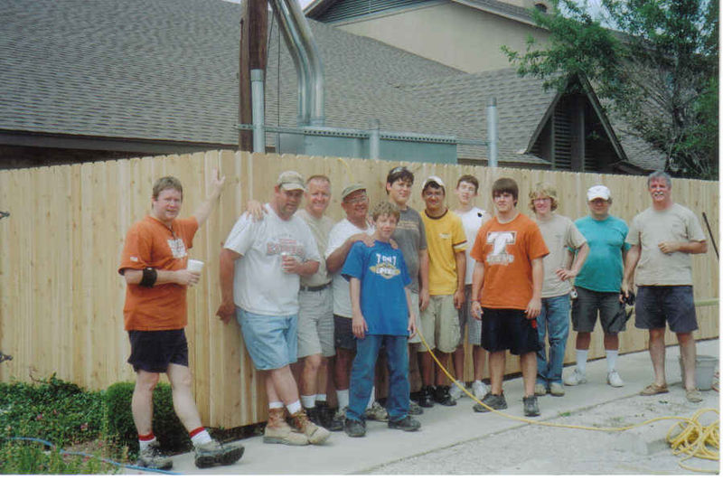 Daniel and his crew in front of St. Mary's new fence in Aug. 2006